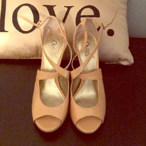 Nude patent leather heels